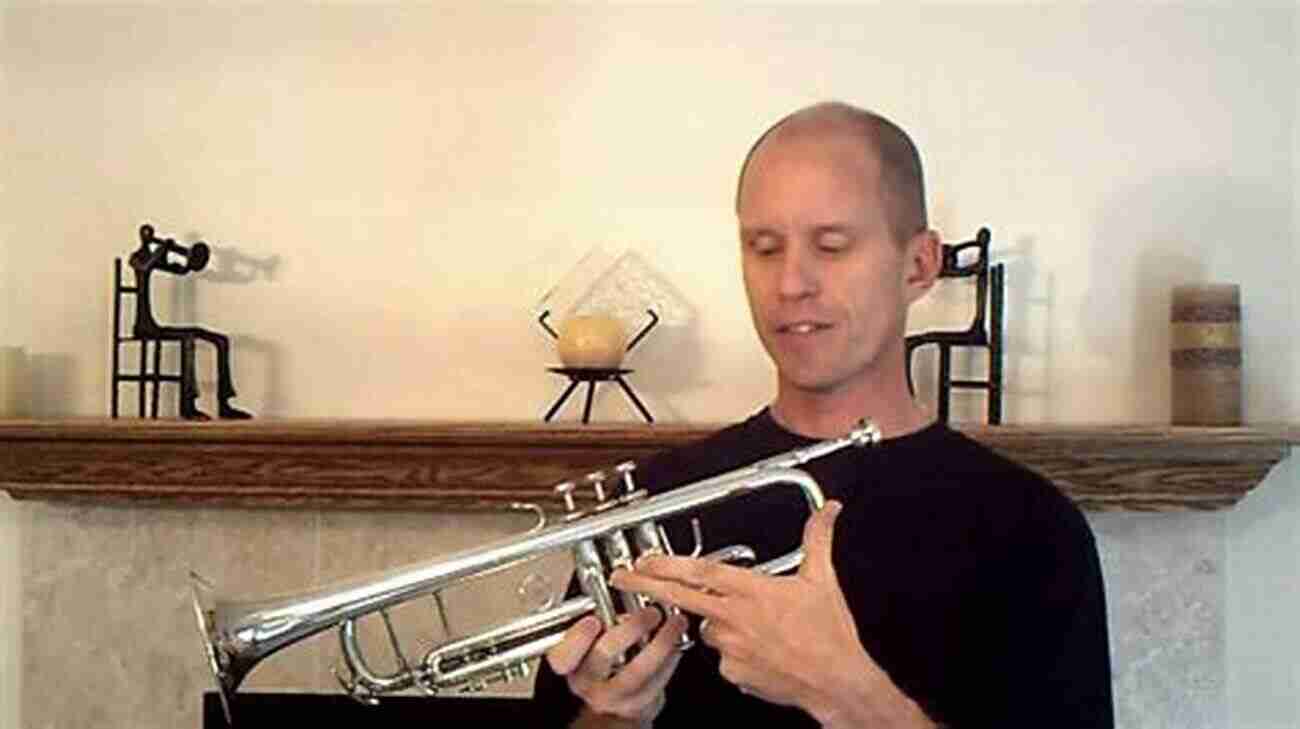 A Beginner Learning To Play The Trumpet With Focused Determination Trumpet Lessons For Beginners: Teach Yourself How To Play Trumpet (Free Video Available) (Progressive Beginner)