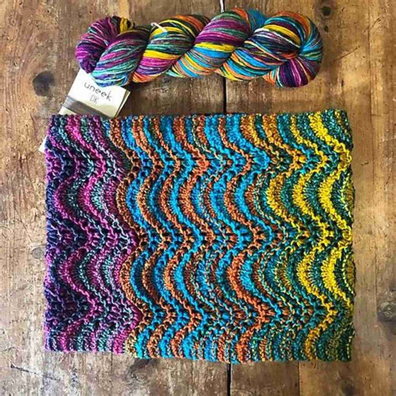 A Close Up Of The Colorful Chevron Cowl Pattern Completed In A Vibrant Combination Of Colors. Cowl Knitting Ideas: Cowl Knitting Patterns Are Sure To Delight You: Knit Stylish Cowl