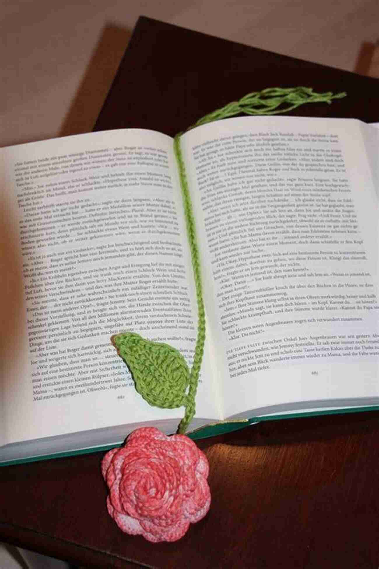 A Graceful Crocheted Rose Bookmark Placed In A Book Rose Crochet Tutorials: Creative And Beautiful Ideas To Crochet Rose