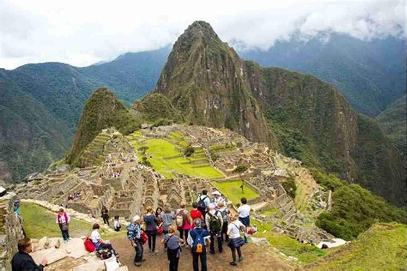 A Group Of Tourists Exploring The Wonders Of Machu Picchu Machu Picchu: The Ultimate Guide To Exploring Machu Picchu And Its Hidden Attractions