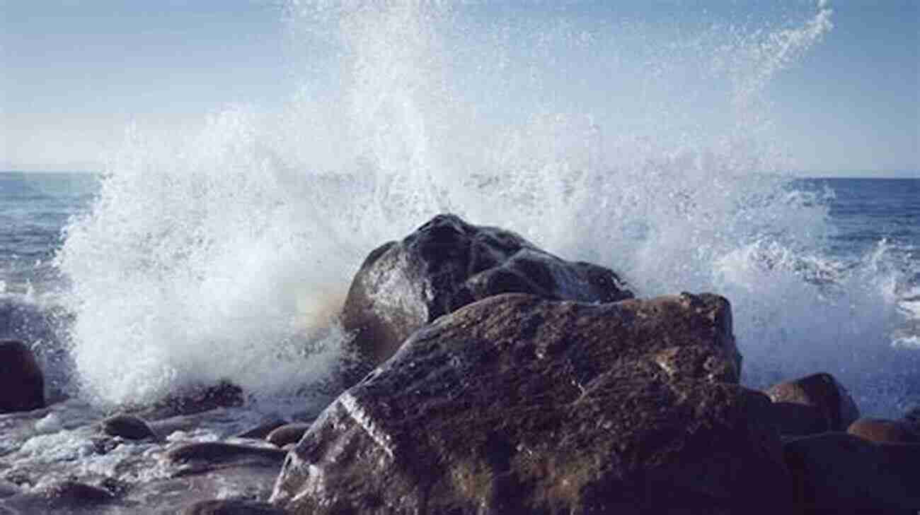 A Mesmerizing Ocean Wave Crashing Onto The Shore Waves And Oscillations In Nature: An 