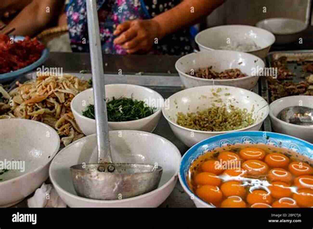 A Street Food Stall Offering A Variety Of Delicious Vietnamese Dishes A Complete Guide To Ho Chi Minh City