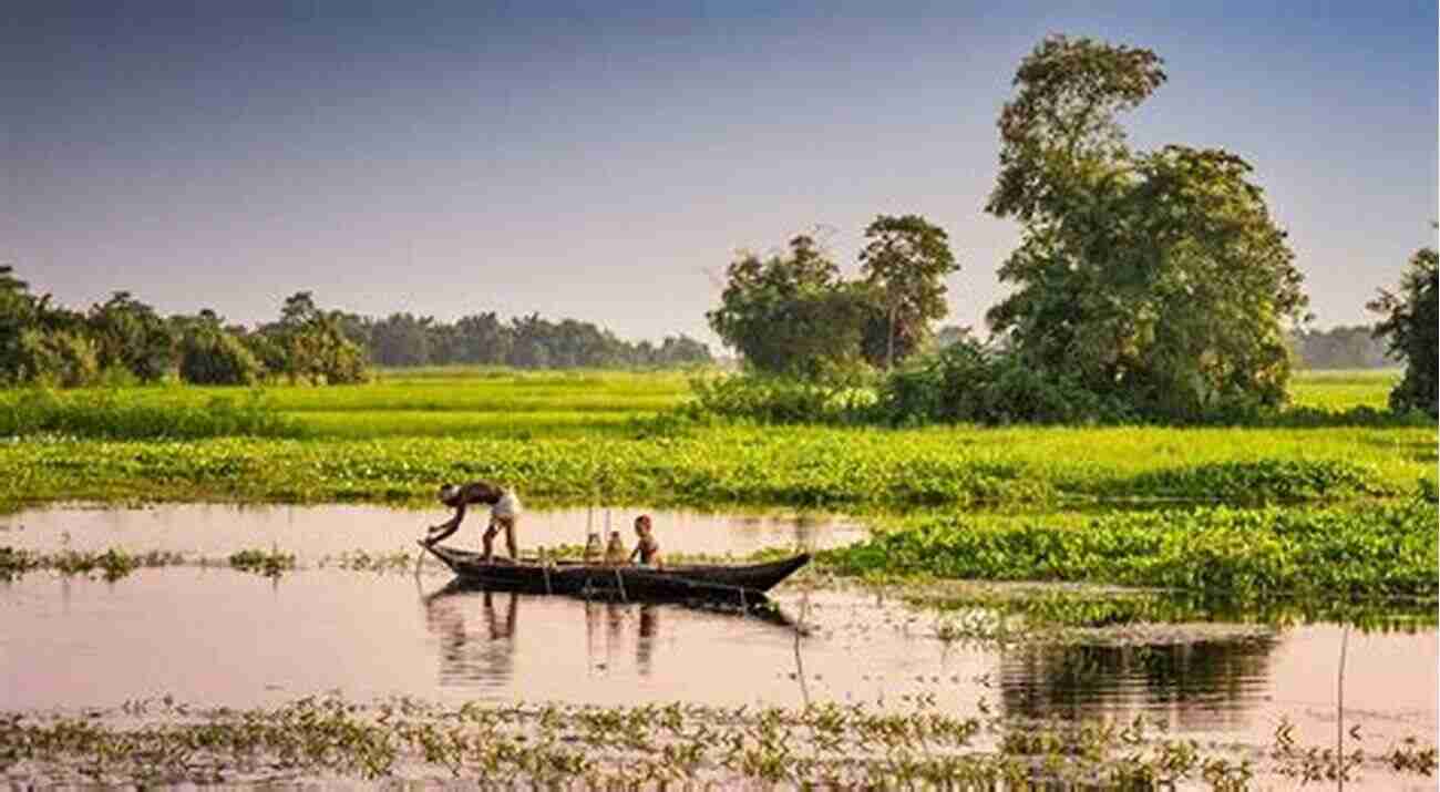 Brahmaputra River Flowing Amidst Picturesque Landscapes Rafting Down The Mystic Brahmaputra