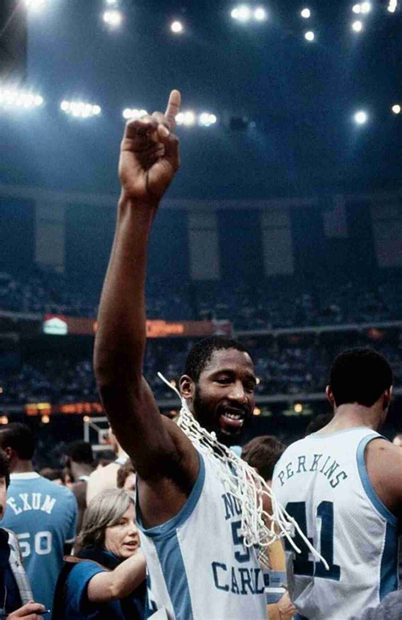 James Worthy Holding The Basketball In Triumph After Winning The NBA Championship James Worthy S NBA Career: Interesting Information About James Worthy: James Worthy