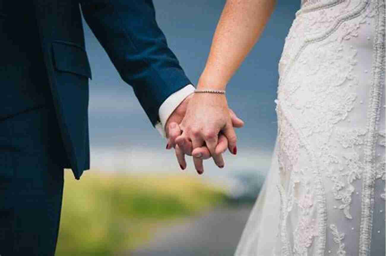 Bride And Groom Holding Hands The Night Before The Wedding