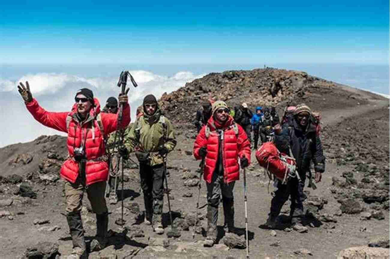 Hiker Reaching The Summit Of Mount Kilimanjaro Five Star Trails: Adirondacks: Your Guide To 46 Spectacular Hikes