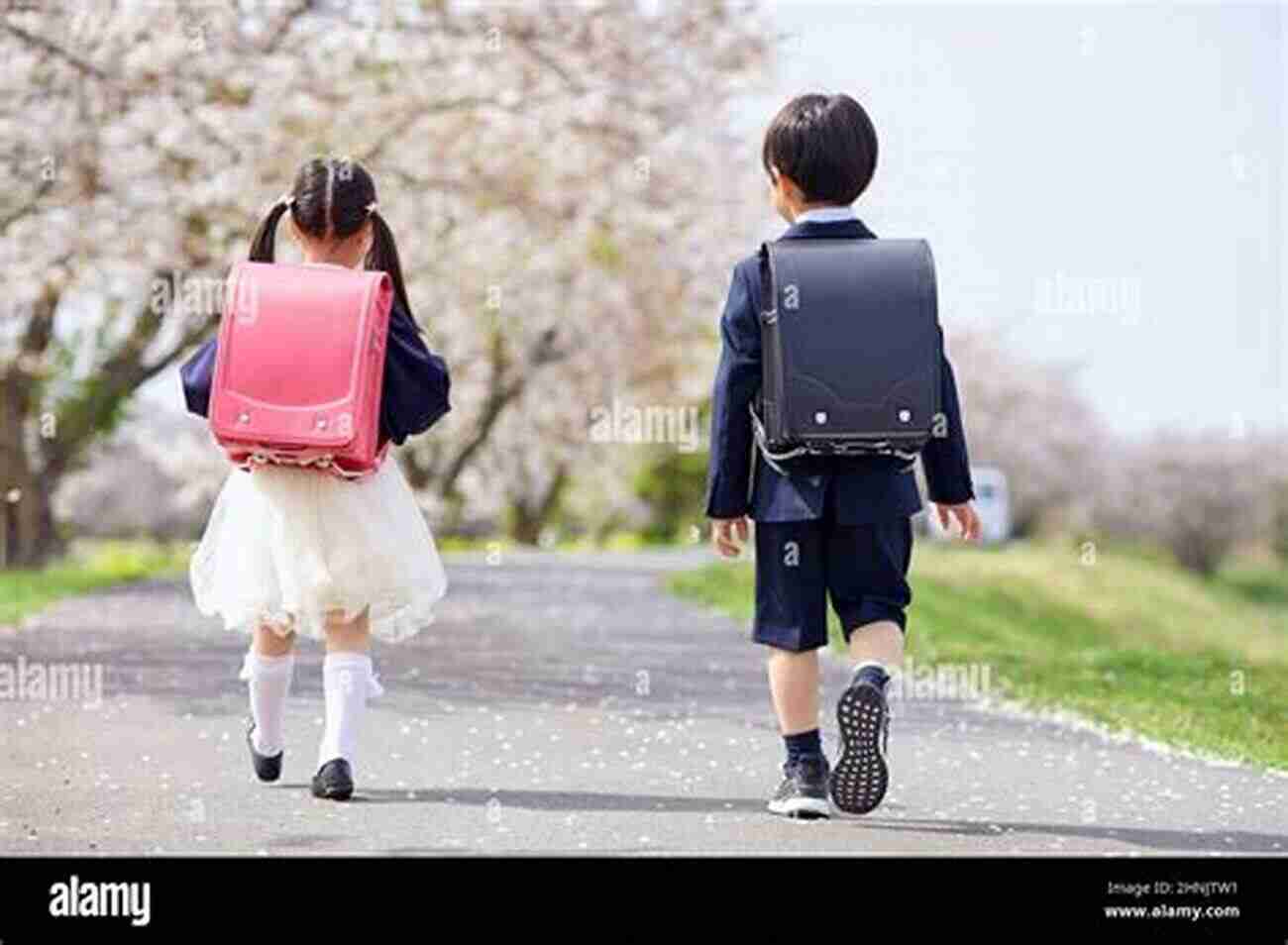 Young Japanese Student Walking Under Cherry Blossom Trees In Tokyo Japan The Modern History Vol 2 : Telling A Story About Japan (FRESH MAN)